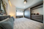 Mater suite with king bed and en suite bathroom